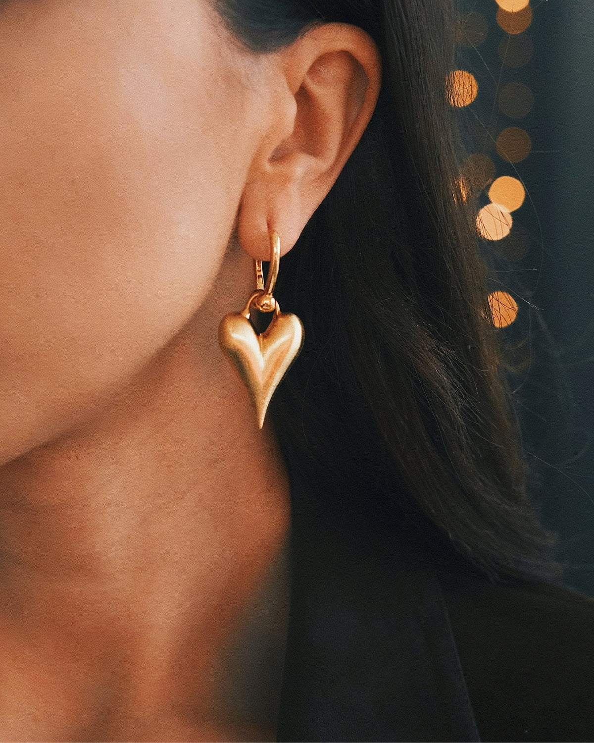 Puffed Heart Huggies — Gold-Tone Huggie Earrings, alternate view