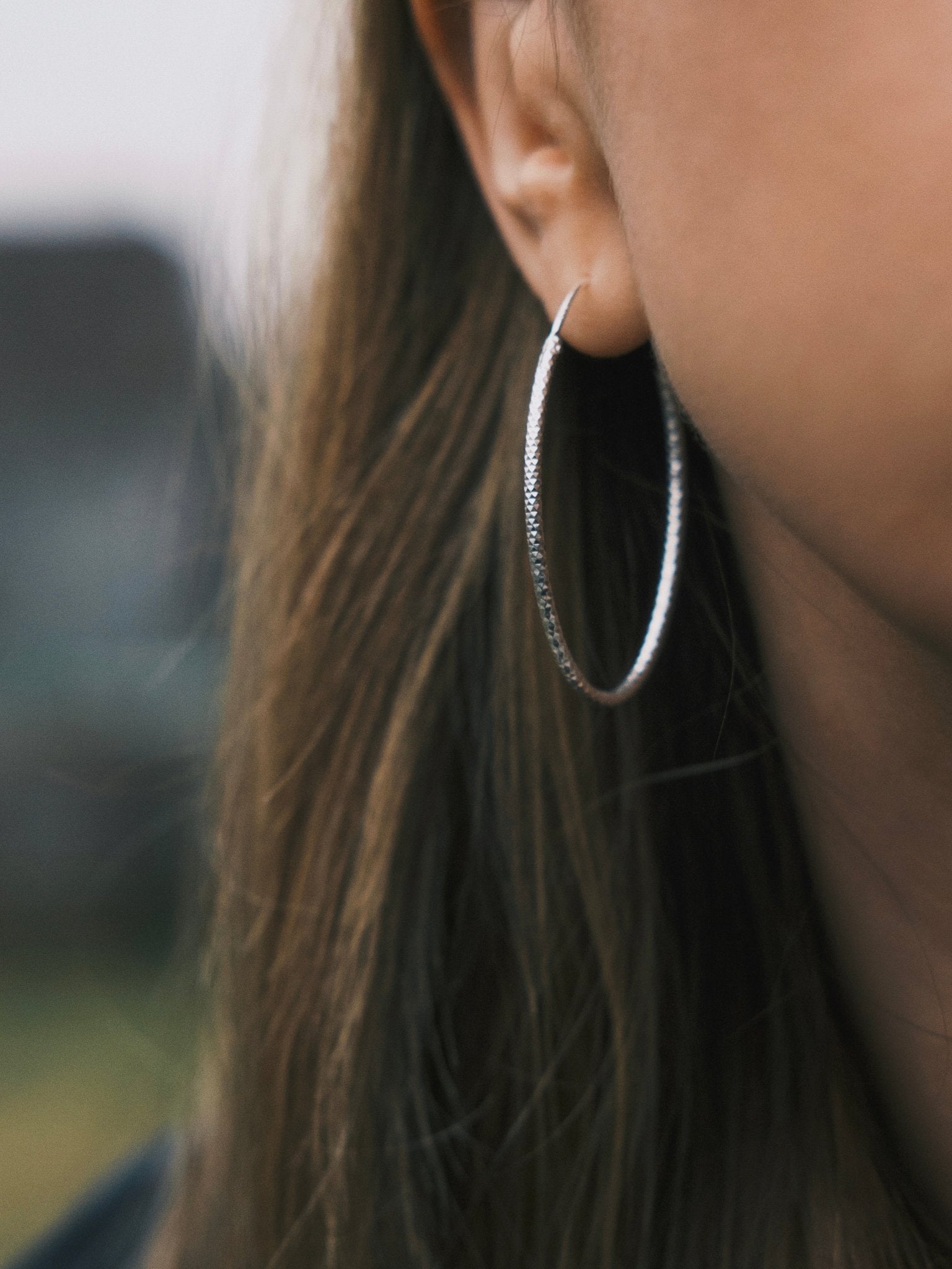 Faceted Oval Hoops — Sterling Silver Hoop Earrings, alternate view